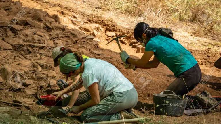 133337299-archaeologist-women-working-in-antique-fort-zamora